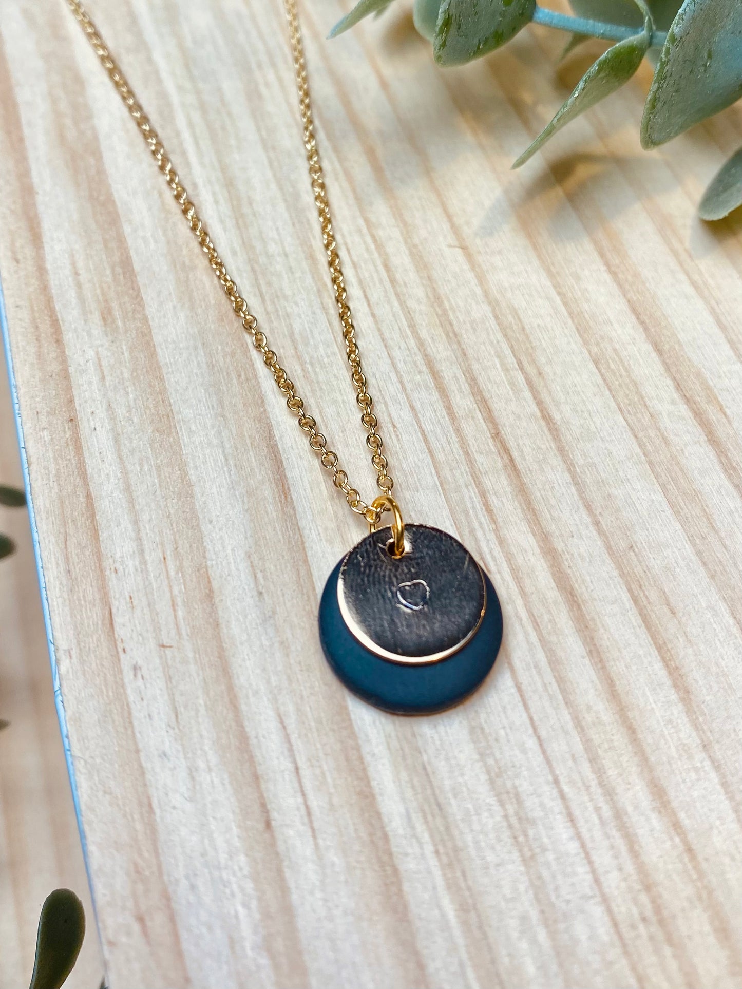 Black Circle Necklace With Gold Charm