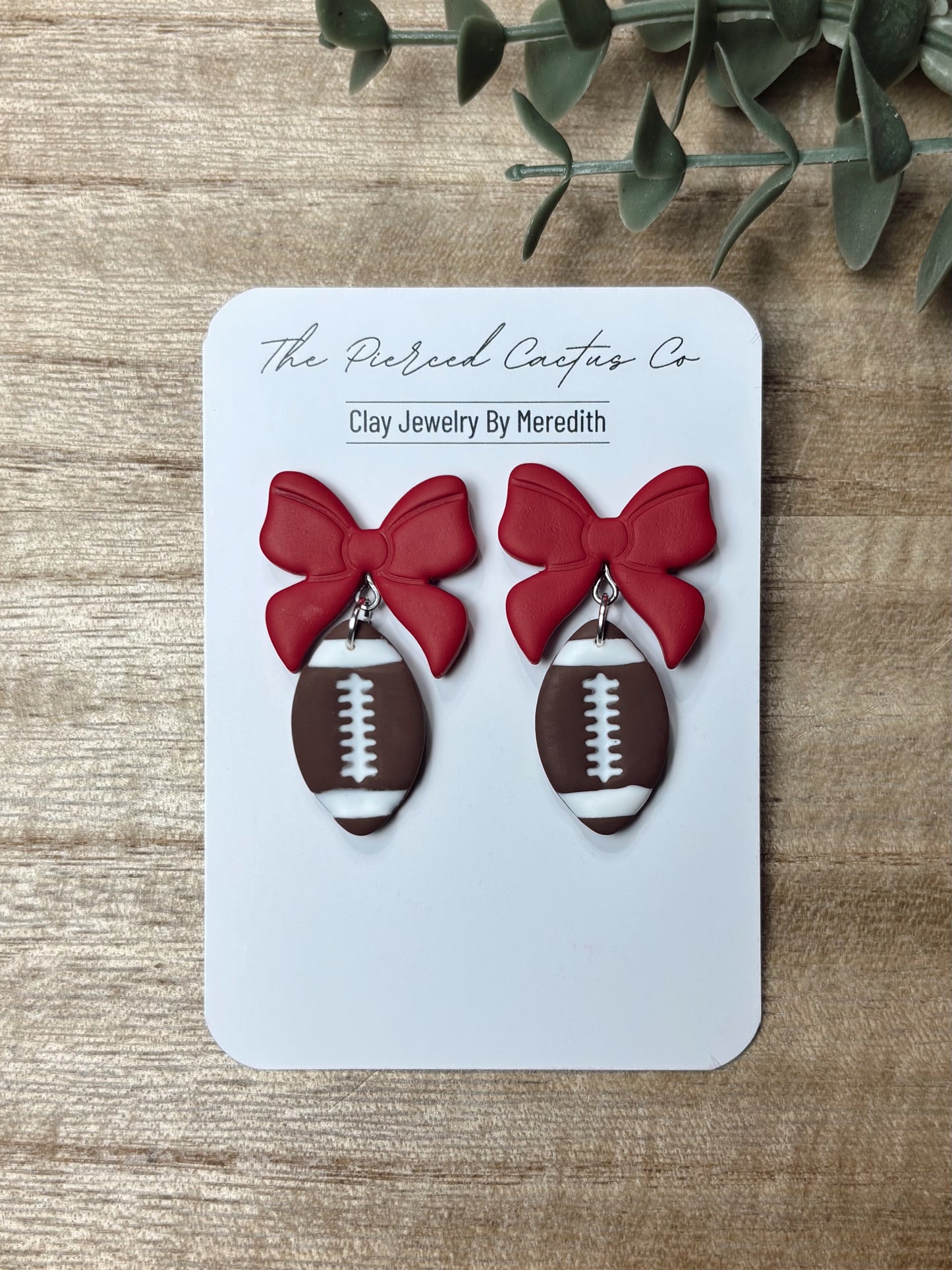 Football Bow Dangle Earrings – Handmade Clay Jewelry | The Pierced Cactus Co.