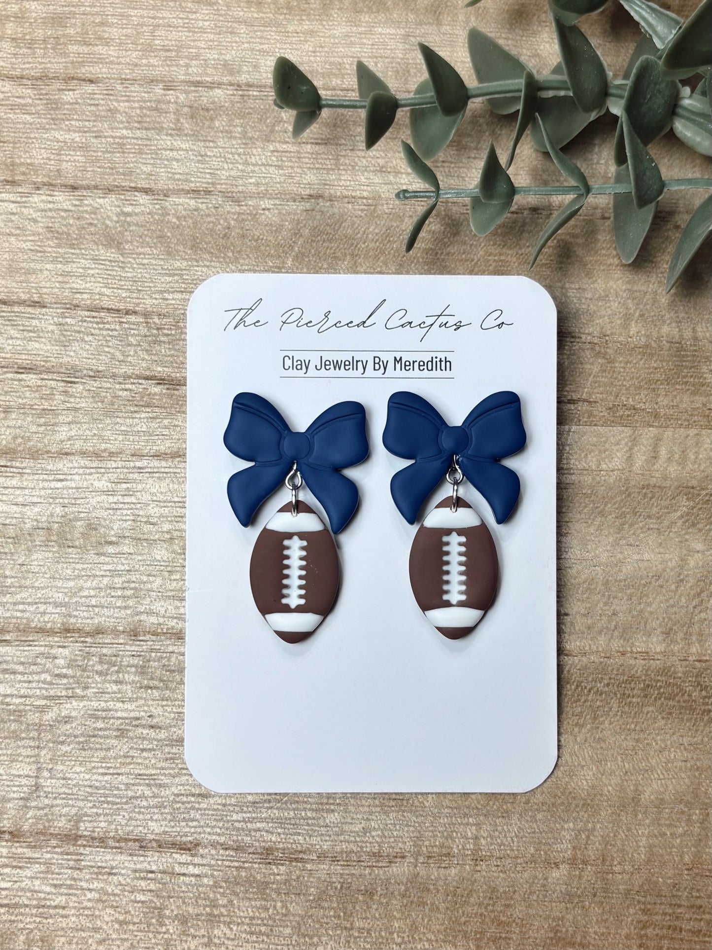 Football Bow Dangle Earrings – Handmade Clay Jewelry | The Pierced Cactus Co.