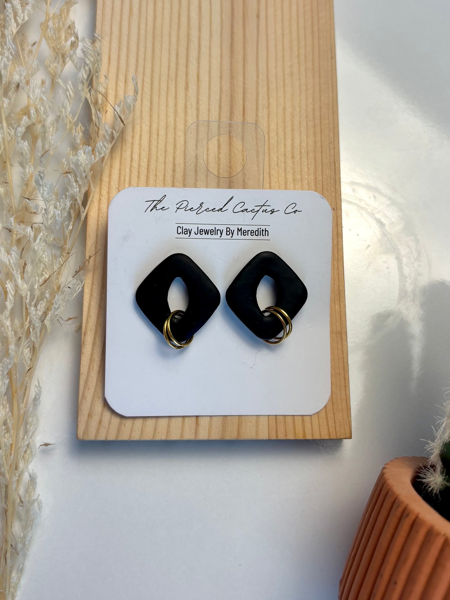 Large Black & Gold Stud