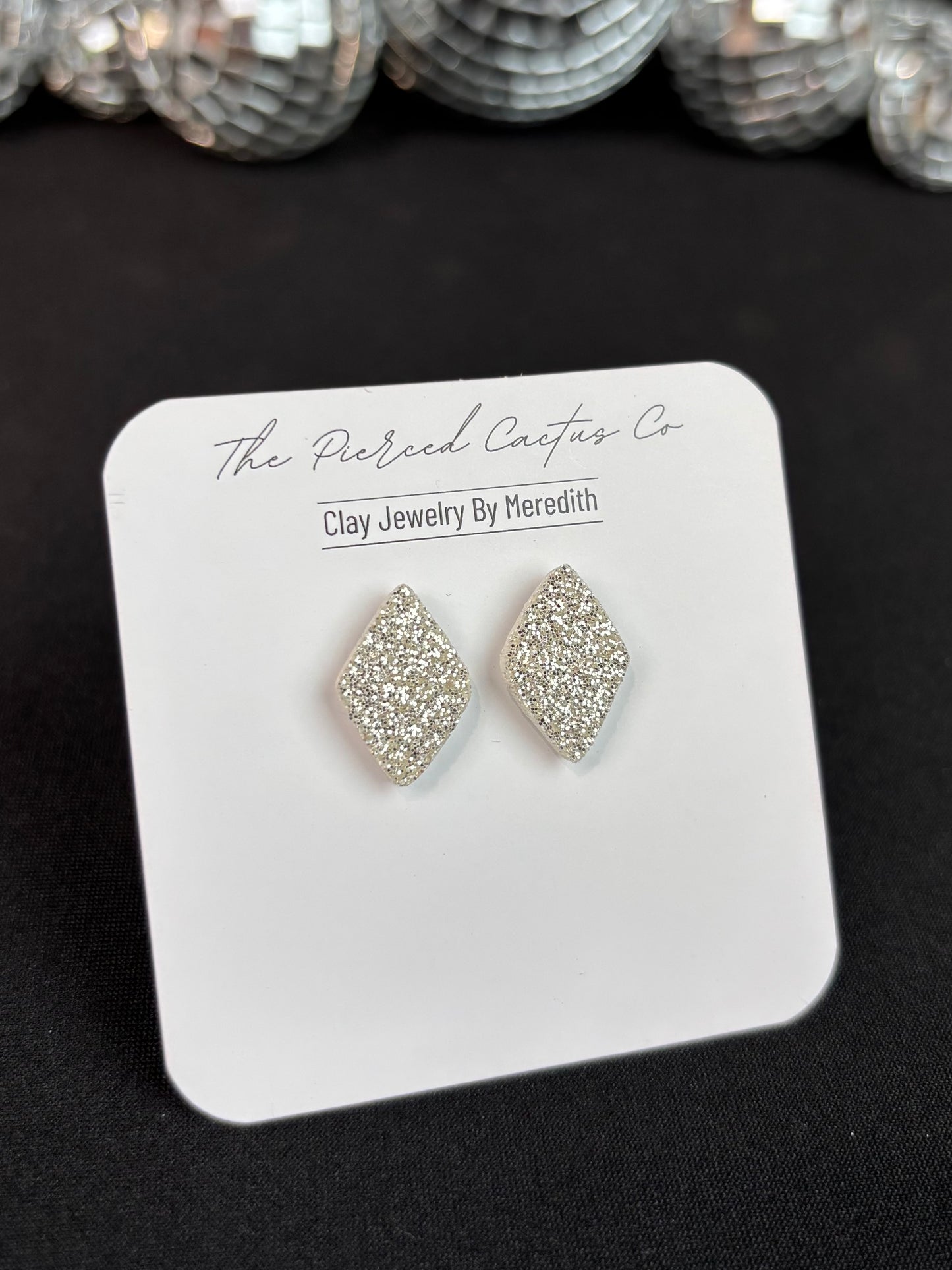 Diamond Shaped Silver Glittered Studs