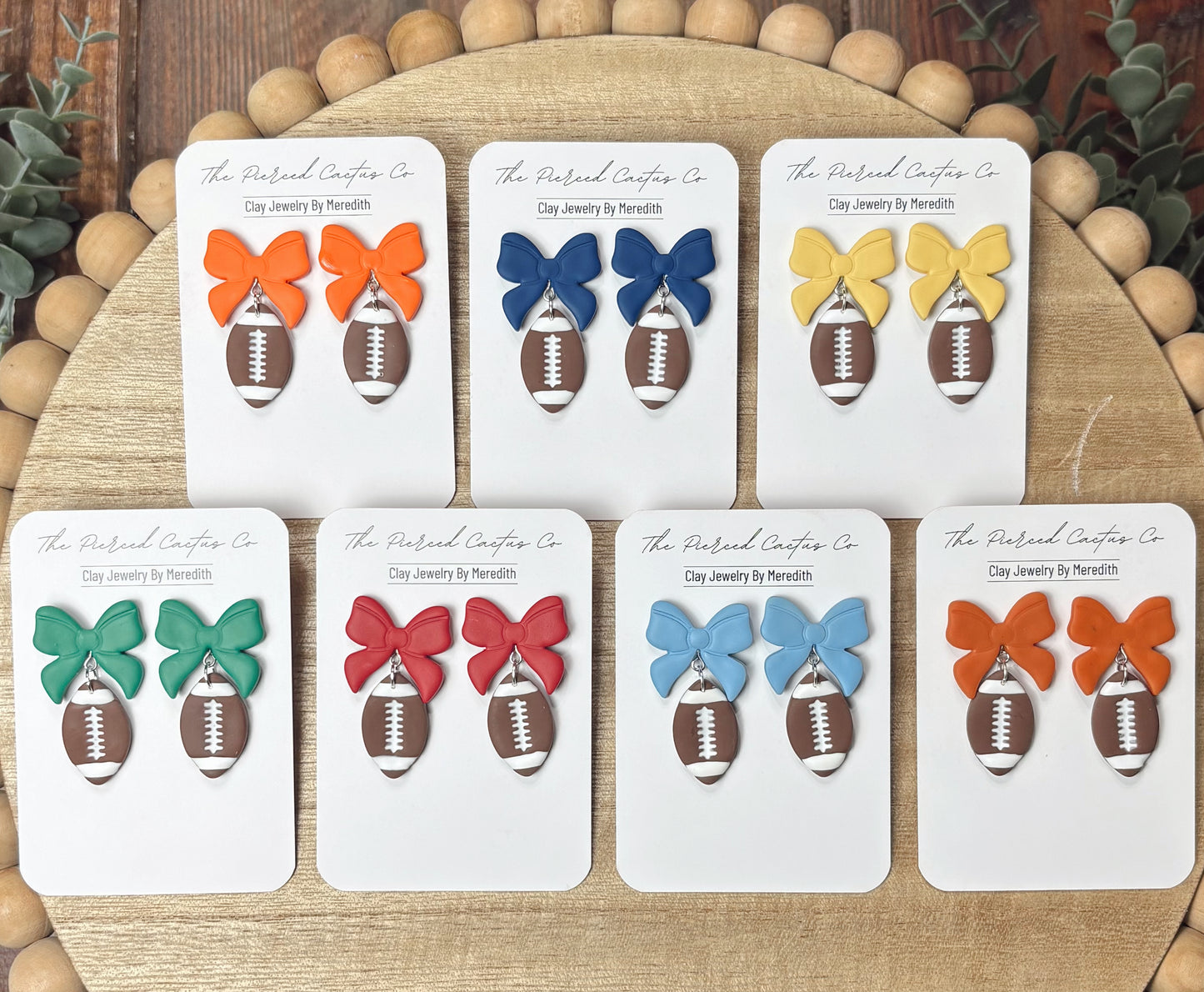 Football Bow Dangle Earrings – Handmade Clay Jewelry | The Pierced Cactus Co.