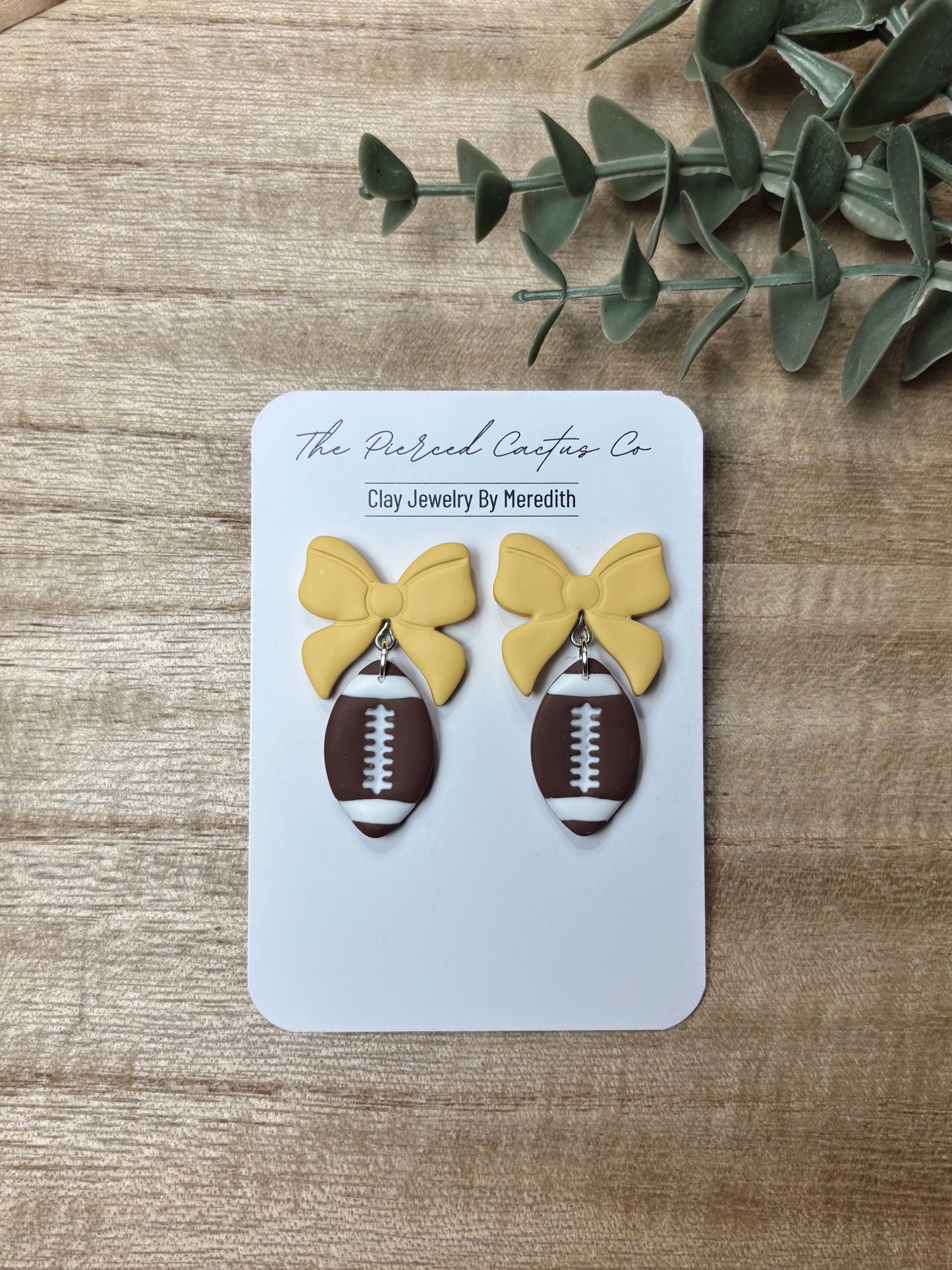Football Bow Dangle Earrings – Handmade Clay Jewelry | The Pierced Cactus Co.